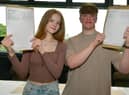 Heading for university - Leah Briggs, 18 and Harry Smith, 18, with their results.