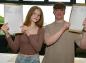 Heading for university - Leah Briggs, 18 and Harry Smith, 18, with their results.