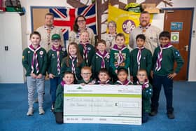 28th Lincoln Greenlands Scout Group with a cheque for £1,500