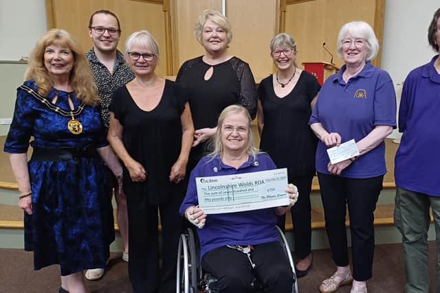 Members of Lincolnshire Wolds Riding for the Disabled received the cheque at The Phoenix Singers' summer concert. Image: Dianne Tuckett