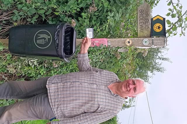 Coun Ian Fleetwood with a QR sticker