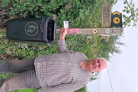 ​Coun Ian Fleetwood with a QR sticker