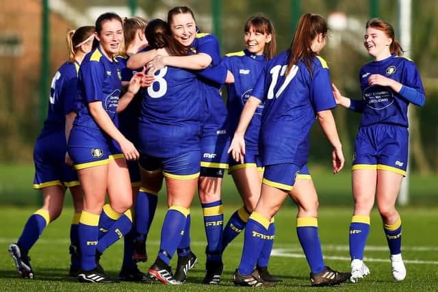 Trinity celebrate Nadina Green's equaliser.