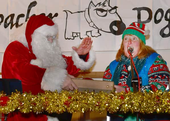 Santa switches on the lights at Alford Christmas market.