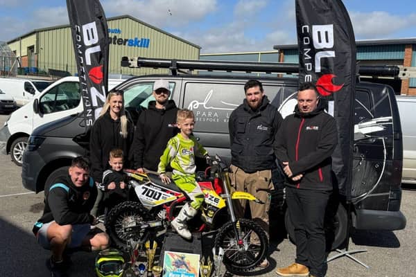 Mac Tilston with his sponsors and family