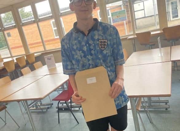 Barnes Wallis's Charlie Courtney with his GCSE results.