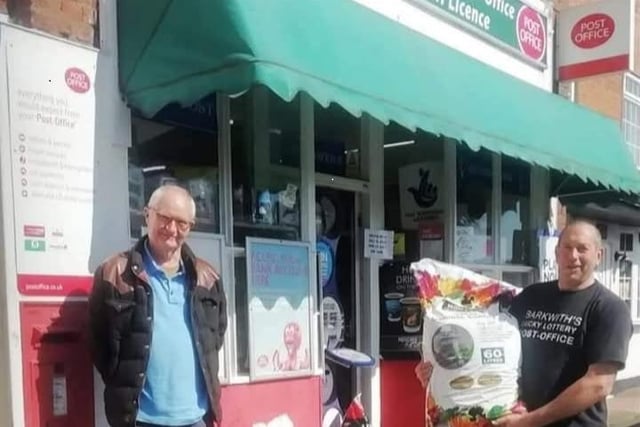 David Ward outside his post office with actor Sir Jim Broadbent.