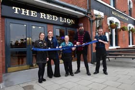 It's open: Pictured at the ribbon cutting are (from left) Jade Ogden, Samantha Clayton, Abbey Gibb - manager, Gary Starr and David Pell