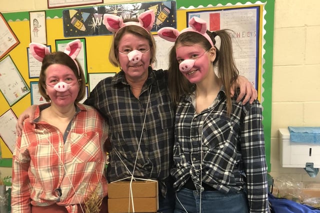 Ruskington Winchelsea School staff as the Three Pigs.