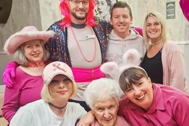 Residents and staff of Syne Hills Residential Home in the pink in memory of staff member who died of cancer.