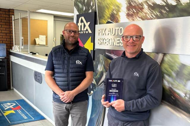 Brothers Peter and Joe Chapman, both directors of Fix Auto Skegness, with their award.