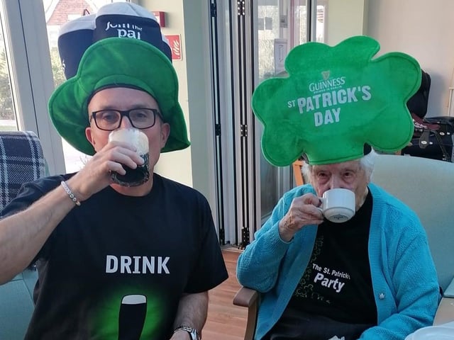 Christopher Sweeney enjoying his pint with 102 year old Audrey Jenney.
