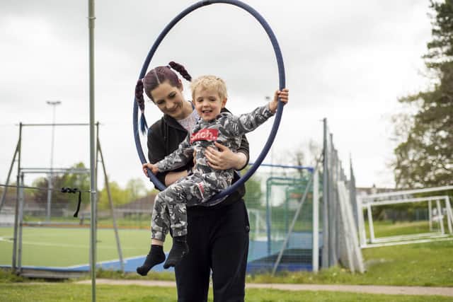 Mckenzie Davis, 3, has a go at aerial skills.