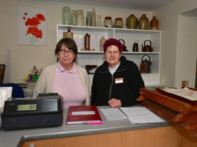 A warm welcome. Volunteers (from left) Janet Garner-Jones and Deb Austin in the reception area and shop.