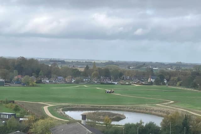 Work is ongoing at the Dion's Wood nature reserve - as pictured recently from Pilgrim Hospital.