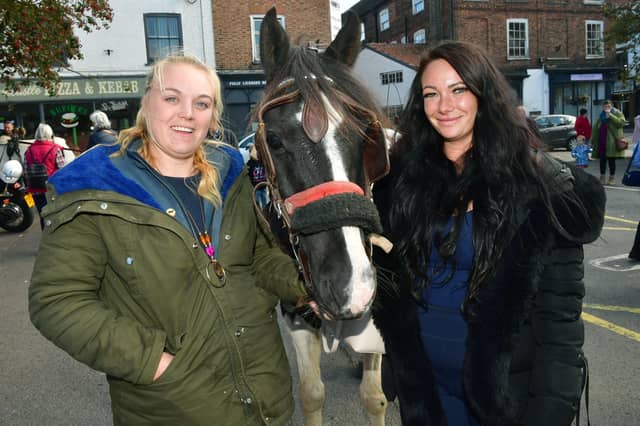 Dani Dodds, who helped to set up Didi Riders And Drivers, is pictured at Sunday's harvest festival event in Horncastle with Leah Simpson, of the group, and one of its ponies, Joey.