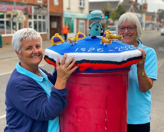 Sutton on Sea's "Crafty Knitters" Kim Hoey and Jessie Smith with a postbox topper to commemorate Queen Elizabeth II. Photo: Chris Frear