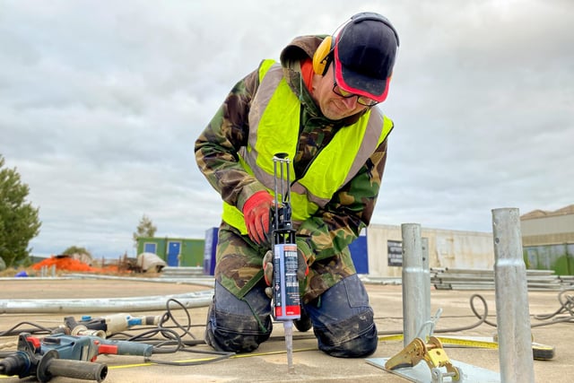 Jon Dean at work on the new hangar's foundations