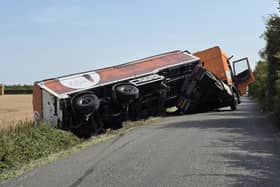 The partially overturned lorry near Louth this morning. Photo: Lincs Police