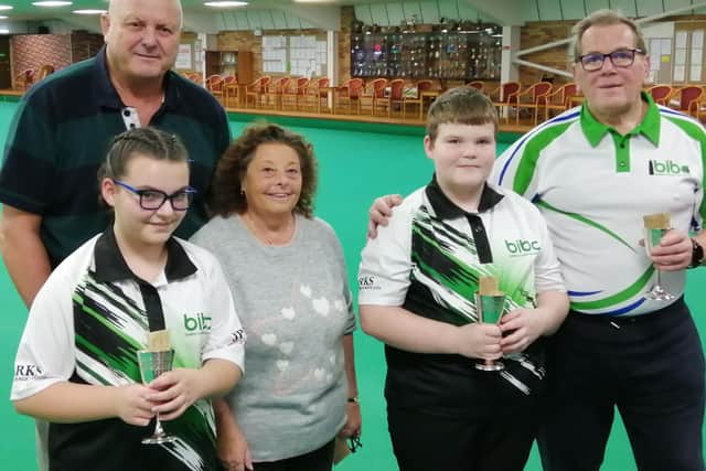 Tournament winners Bella and Jack Hoyles and Mick Wiliamson with sponsors Julie and Trevor Coulson