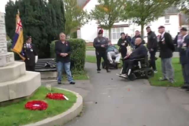 A two minutes silence was held at the memorial at St Matthew's Church for Armistice Day. Photo: Barry Robinson.