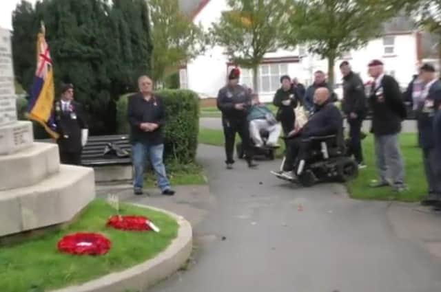 A two minutes silence was held at the memorial at St Matthew's Church for Armistice Day. Photo: Barry Robinson.