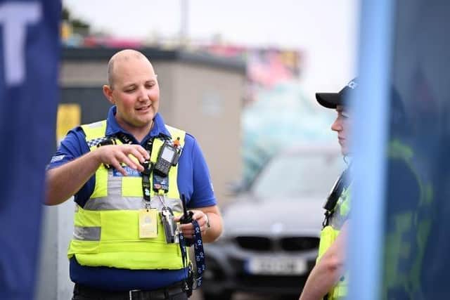 PCSO Barnaby Prince working alongside Chief Superintendent Kate Anderson, Head of Local Policing and Prevention, at one of the Atlantis Alliance community engagement events held in Skegness, in August 2024.