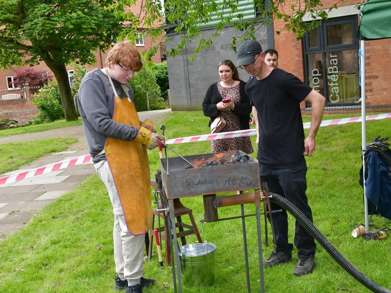 Blacksmithing workshop with Chainbridge Forge. Harvey McAllister 15 of Ruskington with blacksmith, Ryan Atkin