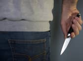A model poses holding a knife. PA Photo. Picture date: Thursday January 16, 2020. Photo credit should read: Andrew Matthews/PA Wire