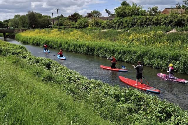 A flotilla of paddlers on the revived Louth Canal. (PHOTO BY: David Higgs)