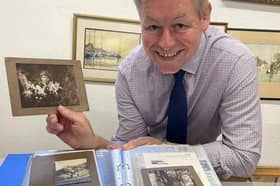 Auctioneer James Lavarack with the famous fairies photos that came under hammer at John Taylors in Louth (PHOTO BY: John Taylors)