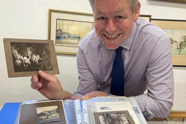 Auctioneer James Lavarack with the famous fairies photos that came under hammer at John Taylors in Louth (PHOTO BY: John Taylors)