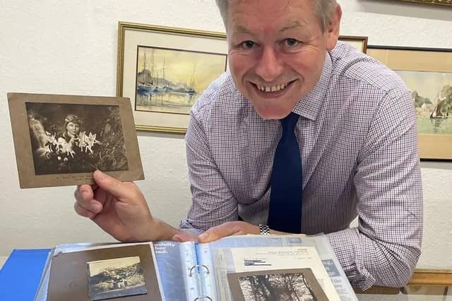 Auctioneer James Lavarack with the famous fairies photos that came under hammer at John Taylors in Louth (PHOTO BY: John Taylors)