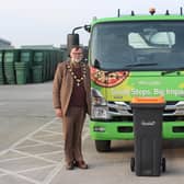 Coun Stephen Bunny with one of the new food waste bins. Photo: WLDC