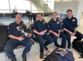 Pictured in Birmingham airport on the way to Turkey are, from left: Neil Woodmansey with Colin the dog, Colin Calam, Ashley Hildred, and Mark Dungworth.
