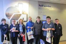 Eresby students at self service machine at Nationeide in Skegness.