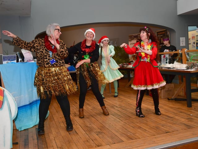 Entertainer Dee Dee Lee gets some of the helpers dancing at the Skegness Storehouse Community Christmas meal.