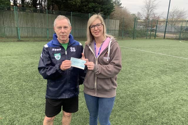 Sleaford Snails donate to New Life Community Larder food bank. The Snails chairman Steve Spick and Lina from the food bank.