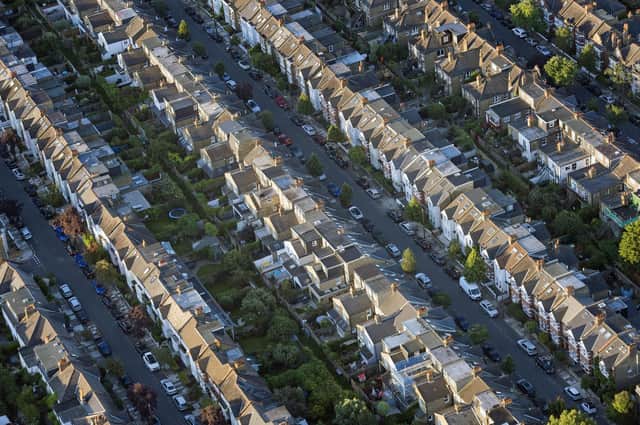 File photo dated 13/08/17 of an aerial view of terraced houses in south west London. Moves away from London appear to have passed a peak, with estimates suggesting around 20,000 fewer properties being bought outside the capital this year than in 2021. In a year which has seen strong house price growth outside London, just over a quarter (26 percent) of "London leavers" in 2022 bought properties with at least four bedrooms, down from 30 percent in 2020, the research from estate agent Hamptons found. Issue date: Monday December 26, 2022.