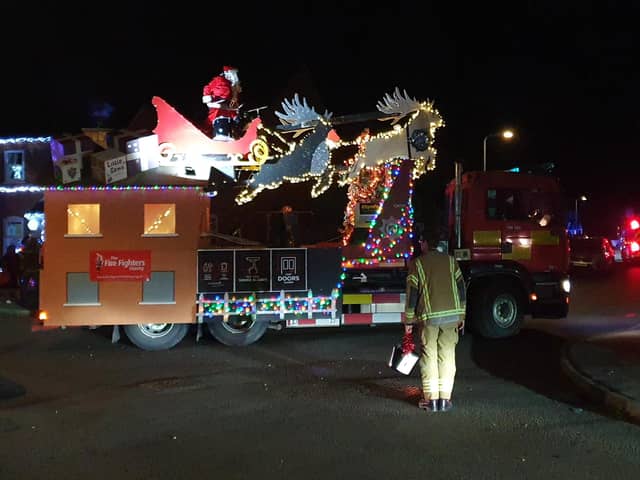 Father Christmas sleighs 'em on his fantastic charity musical tour of Sleaford with the fire service.