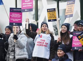 Nurses braving freezing temperatures to form a picket line.