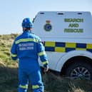 A teenager was rescued when the hole he was digging in sand  collapsed.