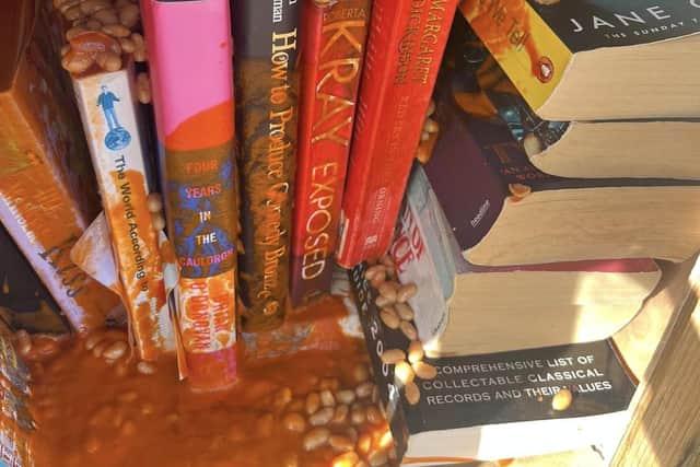 The books had to be thrown away after beans were emptied over them.
