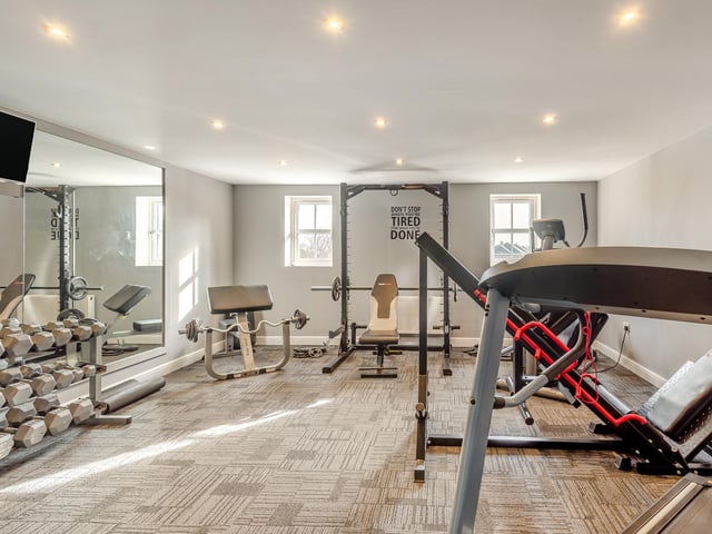 The gym above the garage.