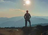 Leverton woman Joanne Self-Shutts stands on Africa's highest mountain.