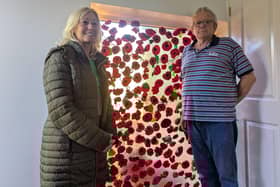 Julia Kime (left) suggested making a display at the chapel and veteran Brian Clark has been making poppies.