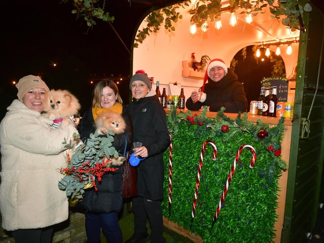 L-R Irina Muntean with Masha, Beth Ellis with Misha, Kayt Muza-Priestley with Becky Schokker of The Old Filling Station and outgoing owner of Down The Road Bistro. Photo: David Dawson