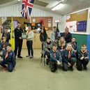 Dad Gavin presenting the defibrillator to Horbling and Billingborough Scout Troop.