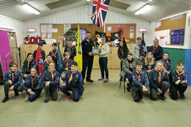 Dad Gavin presenting the defibrillator to Horbling and Billingborough Scout Troop.