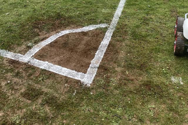 The pitch had to be repaired before the match.